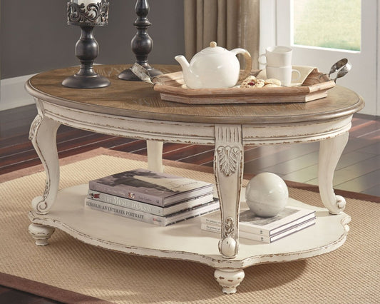 Realyn - Oval Cocktail Table - White / Brown Cocktail Tables by Signature Design by Ashley® - Walls Furniture & Mattress