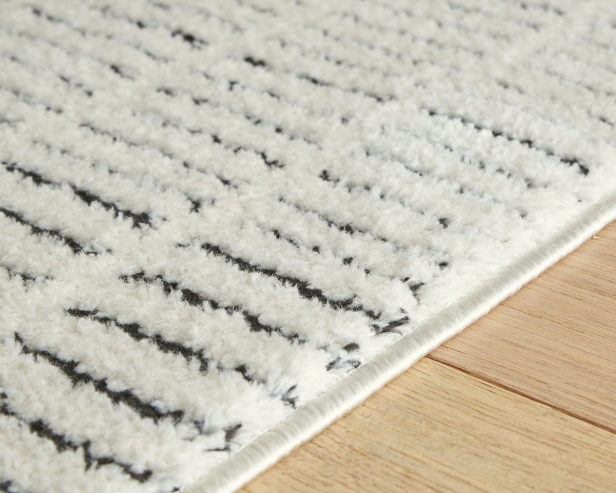 Turinwith - Rug Area Rugs by Signature Design by Ashley® - Walls Furniture & Mattress