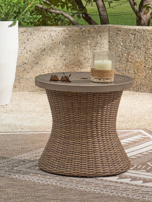 Laguna Heights - Round End Table With Umbrella Option - Beige End Tables by Signature Design by Ashley® - Walls Furniture & Mattress