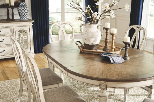 Realyn - Oval Dining Room Extension Table - Chipped White Dining Tables with Extensions by Signature Design by Ashley® - Walls Furniture & Mattress
