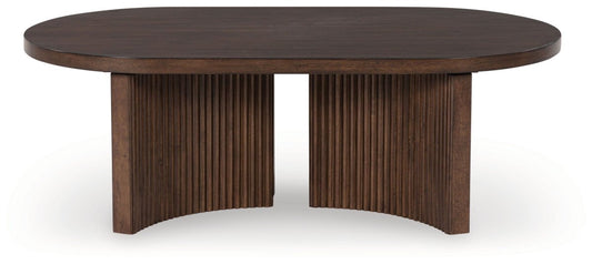 Korestone - Oval Cocktail Table - Dark Brown Coffee Tables by Signature Design by Ashley® - Walls Furniture & Mattress
