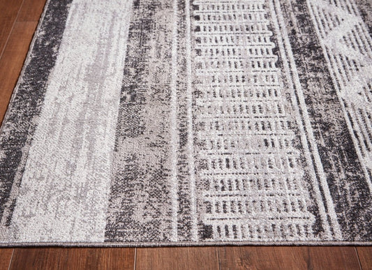 Henchester - Rug Washable Rugs by Signature Design by Ashley® - Walls Furniture & Mattress
