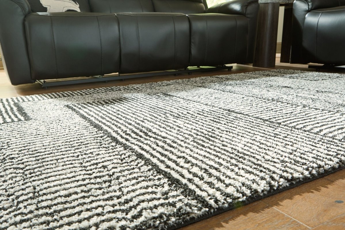 Kurtmen - Rug Area Rugs by Signature Design by Ashley® - Walls Furniture & Mattress