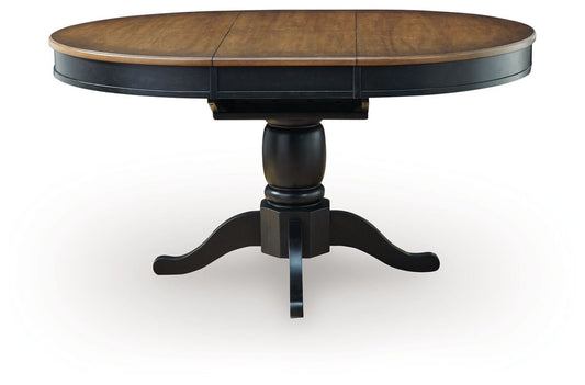 Clorazi - Oval Dining Room Butterfly Extension Table - Black / Brown Dining Tables with Extensions by Signature Design by Ashley® - Walls Furniture & Mattress