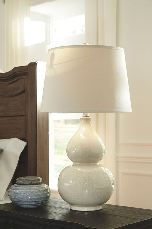 Saffi - Ceramic Table Lamp - Cream Table Lamps by Signature Design by Ashley® - Walls Furniture & Mattress