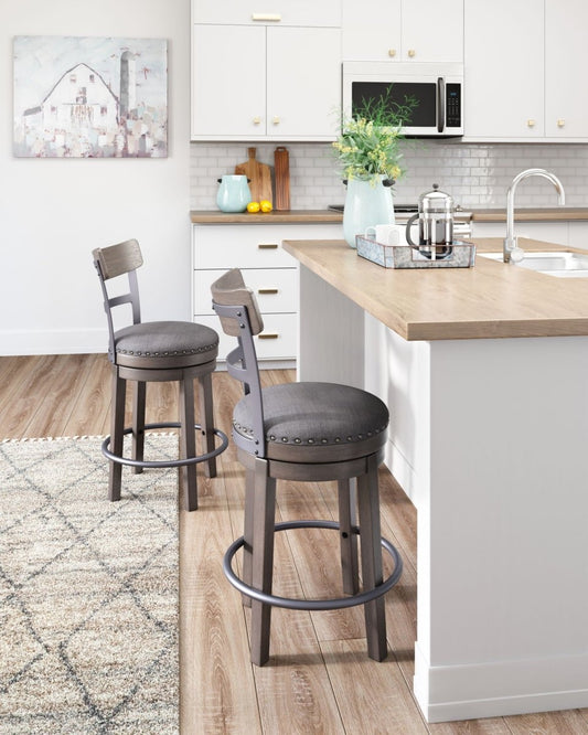 Caitbrook - UPH Swivel Barstool - Gray Counter Height (24" - 27") by Signature Design by Ashley® - Walls Furniture & Mattress