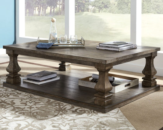 Johnelle - Rectangular Cocktail Table - Gray Cocktail Tables by Signature Design by Ashley® - Walls Furniture & Mattress