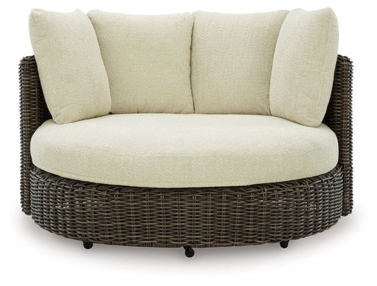 Kimora - Swivel Lounge Chair With Cushion - Beige / Dark Brown Swivel Chairs by Signature Design by Ashley® - Walls Furniture & Mattress