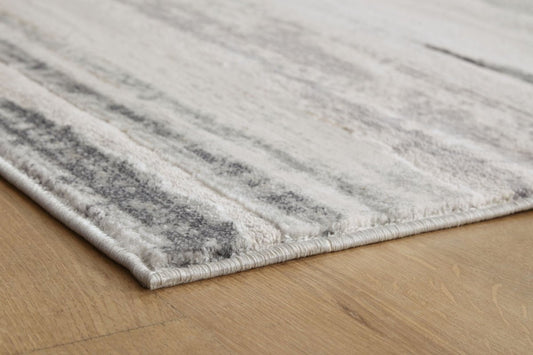 Abanett - Rug Area Rugs by Signature Design by Ashley® - Walls Furniture & Mattress