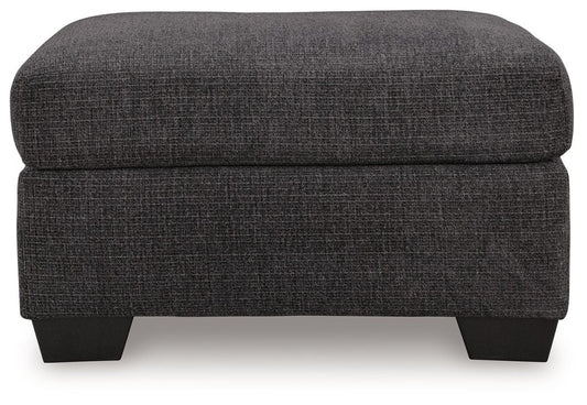 Loreo - Ottoman - Ebony Upholstered Ottomans by Benchcraft® - Walls Furniture & Mattress