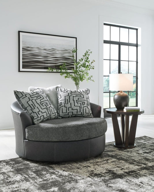 Brixley Pier - Oversized Swivel Accent Chair - Graphite Swivel Chairs by Benchcraft® - Walls Furniture & Mattress
