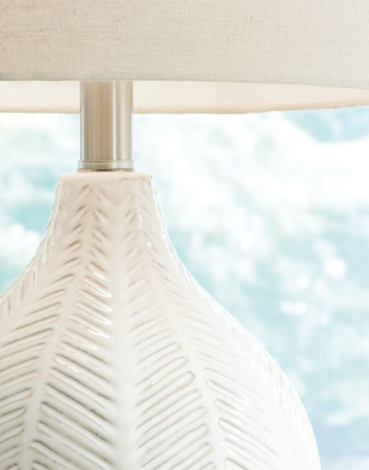 Rainermen - Ceramic Table Lamp - Off White Table Lamps by Signature Design by Ashley® - Walls Furniture & Mattress