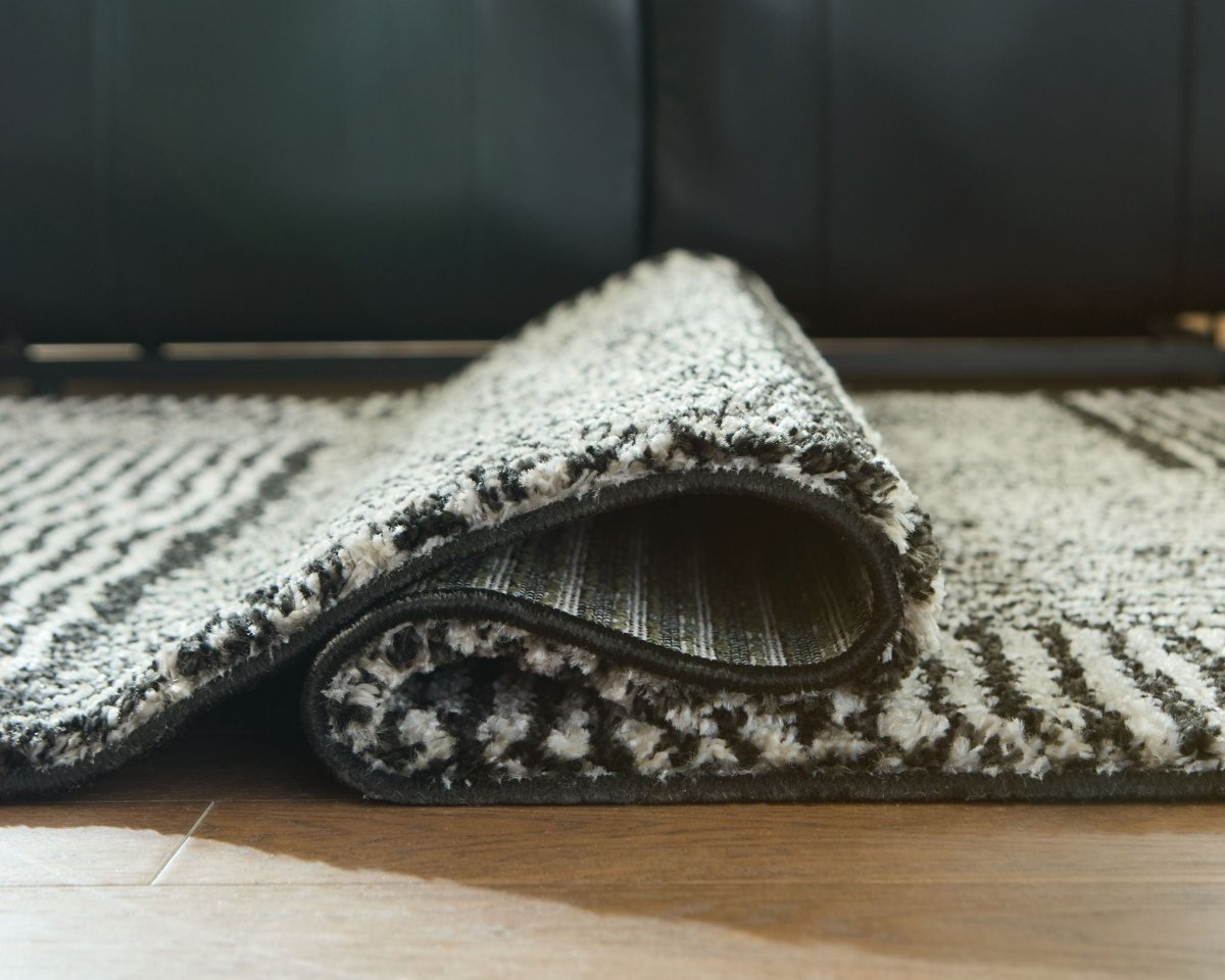 Kurtmen - Rug Area Rugs by Signature Design by Ashley® - Walls Furniture & Mattress