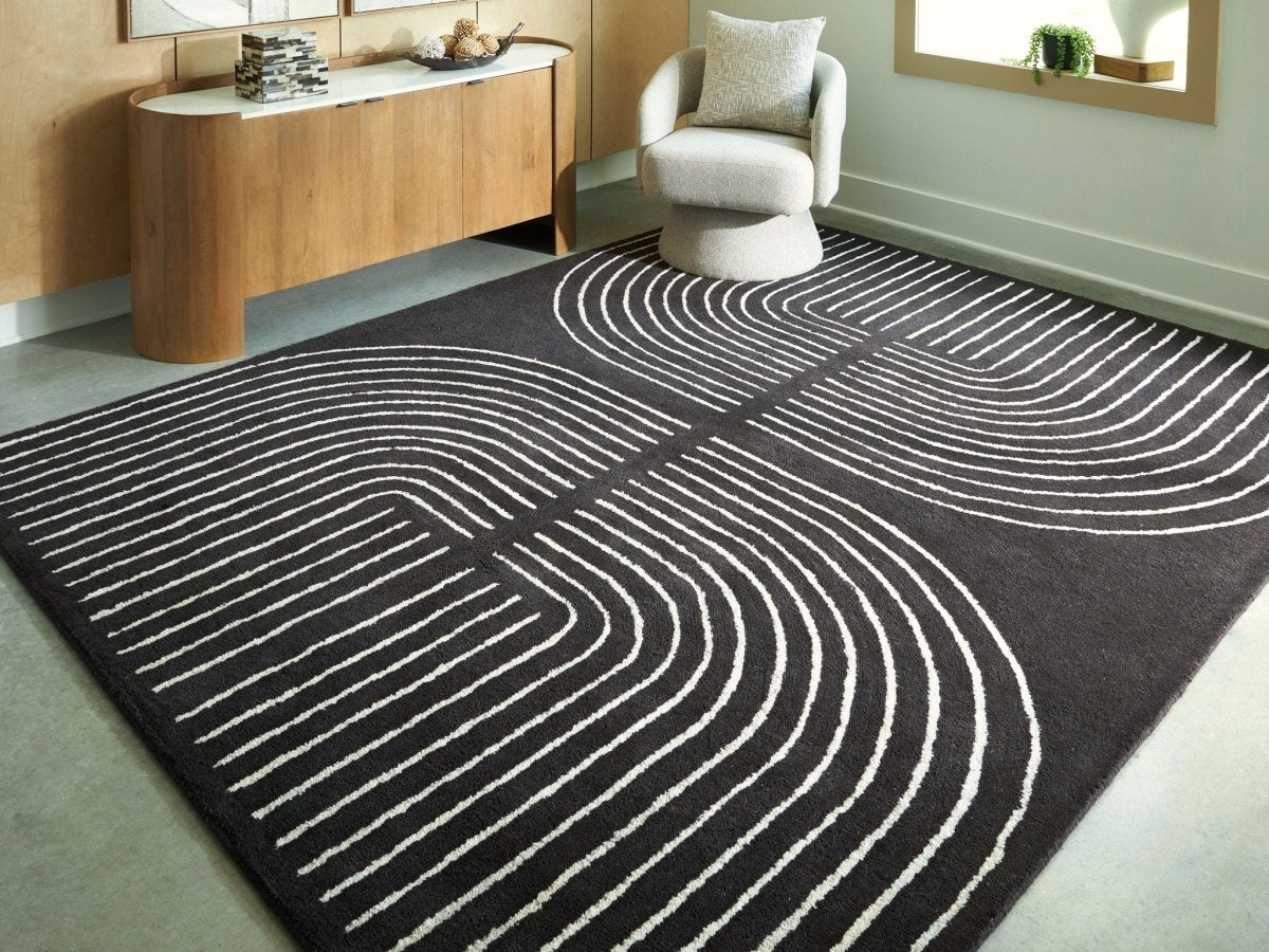 Eldonmore - Rug Area Rugs by Signature Design by Ashley® - Walls Furniture & Mattress