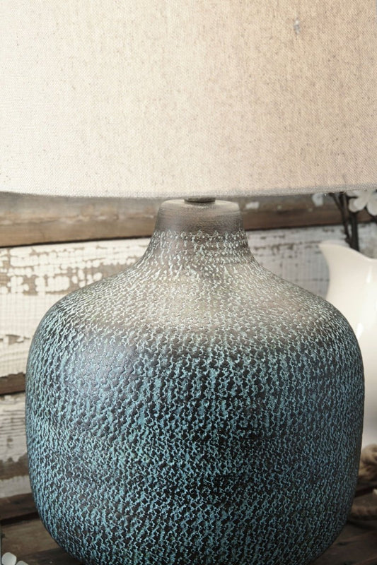 Malthace - Metal Table Lamp - Patina Table Lamps by Signature Design by Ashley® - Walls Furniture & Mattress
