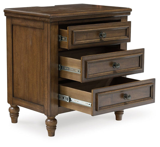 Sturlayne - Three Drawer Night Stand - Brown Nightstands w/ Charging Stations by Benchcraft® - Walls Furniture & Mattress