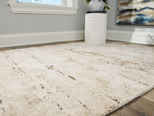 Kasney - Rug Area Rugs by Signature Design by Ashley® - Walls Furniture & Mattress