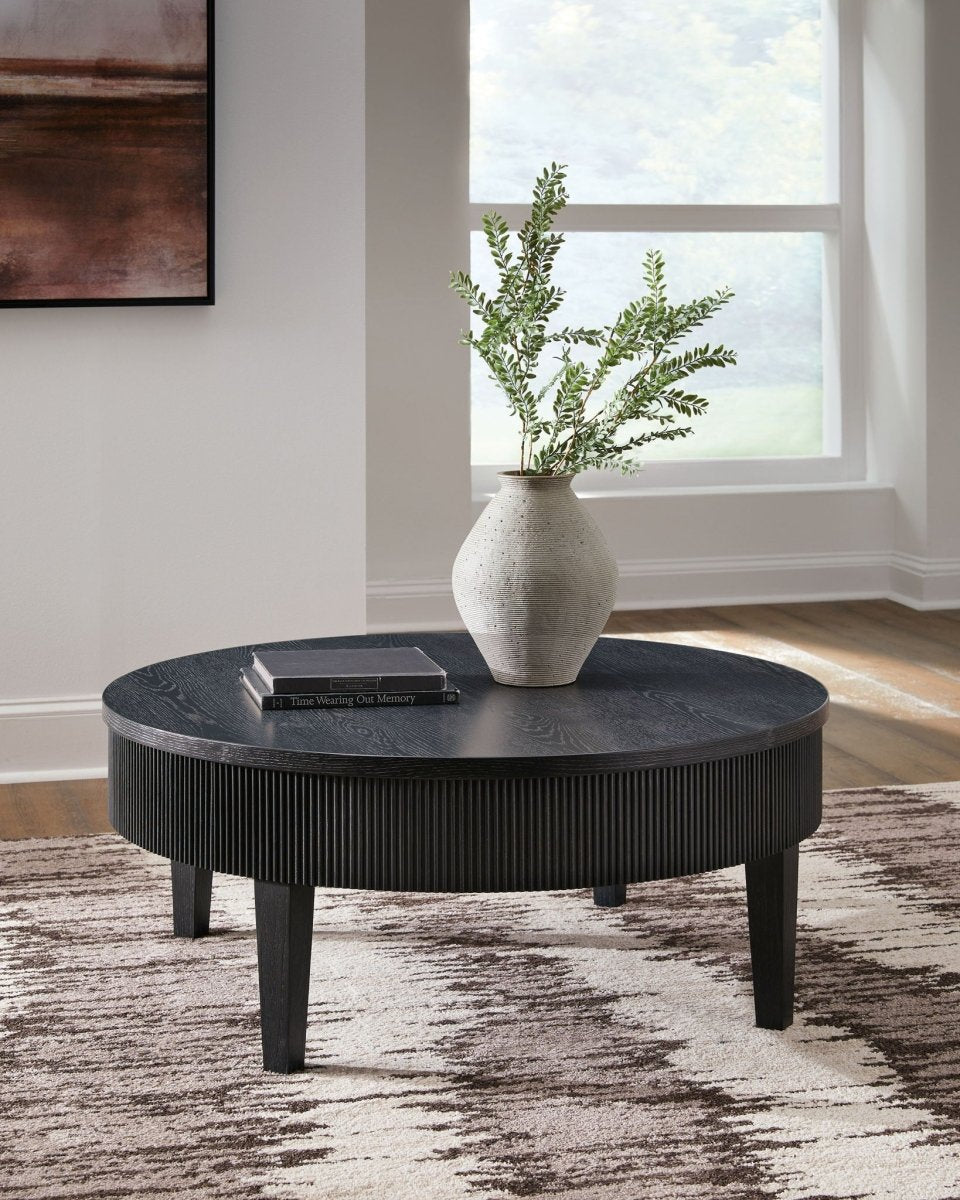 Marstream - Round Cocktail Table - Black Coffee Tables by Signature Design by Ashley® - Walls Furniture & Mattress