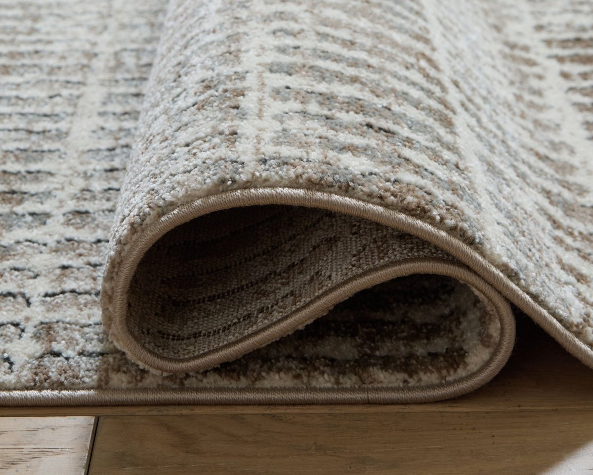 Fuadwick - Rug Area Rugs by Signature Design by Ashley® - Walls Furniture & Mattress
