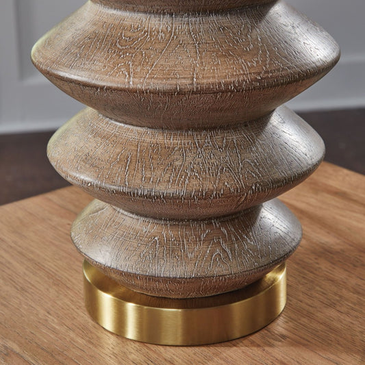 Jyllyard - Poly Table Lamp - Brown / Gold Finish Table Lamps by Signature Design by Ashley® - Walls Furniture & Mattress