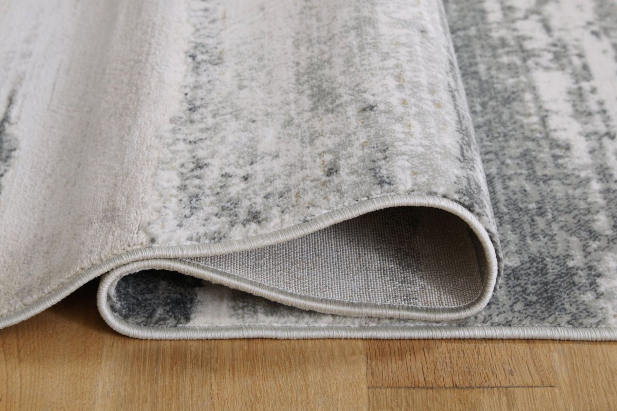 Abanett - Rug Area Rugs by Signature Design by Ashley® - Walls Furniture & Mattress