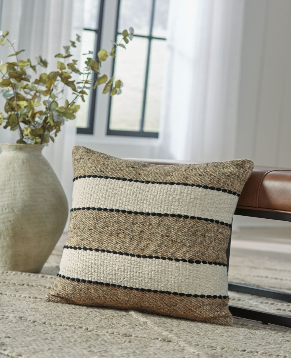 Rueford - Pillow Throw Pillows by Signature Design by Ashley® - Walls Furniture & Mattress