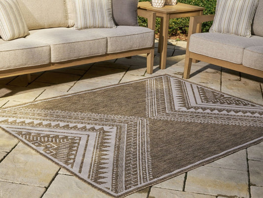 Dunsler - Rug Indoor/Outdoor Rugs by Signature Design by Ashley® - Walls Furniture & Mattress