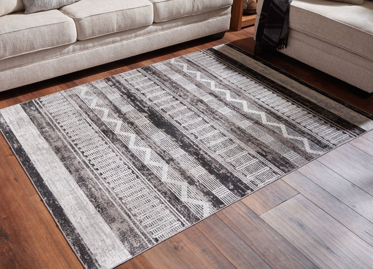 Henchester - Rug Washable Rugs by Signature Design by Ashley® - Walls Furniture & Mattress