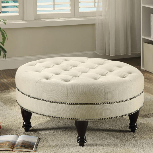 Elchin - Round Upholstered Tufted Ottoman - Oatmeal Upholstered Ottomans by CoasterEssence - Walls Furniture & Mattress