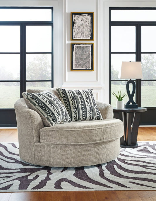 Calnita - Oversized Swivel Accent Chair - Sisal Swivel Chairs by Benchcraft® - Walls Furniture & Mattress