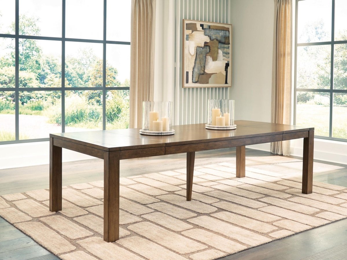 Marxmore - Rectangular Dining Room Butterfly Extension Table - Brown Dining Tables with Extensions by Benchcraft® - Walls Furniture & Mattress