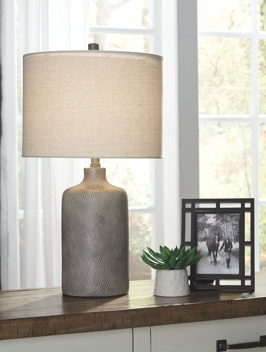 Linus - Ceramic Table Lamp - Antique Black Table Lamps by Signature Design by Ashley® - Walls Furniture & Mattress