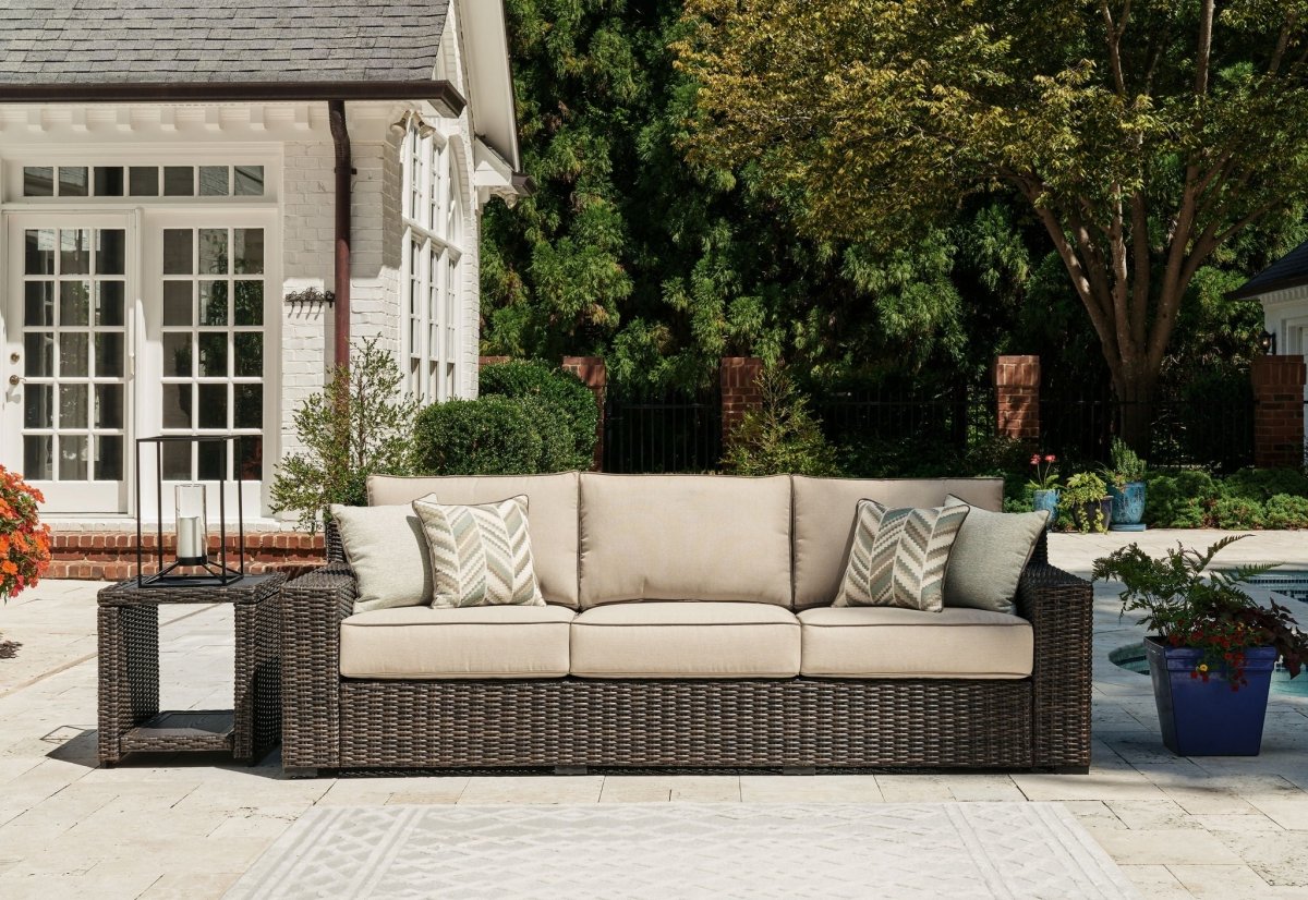 Coastline Bay - Sofa With Cushion - Brown Sofas by Signature Design by Ashley® - Walls Furniture & Mattress