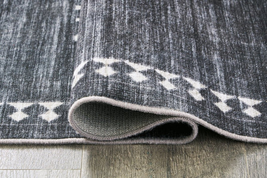 Arloman - Area Rug Washable Rugs by Signature Design by Ashley® - Walls Furniture & Mattress