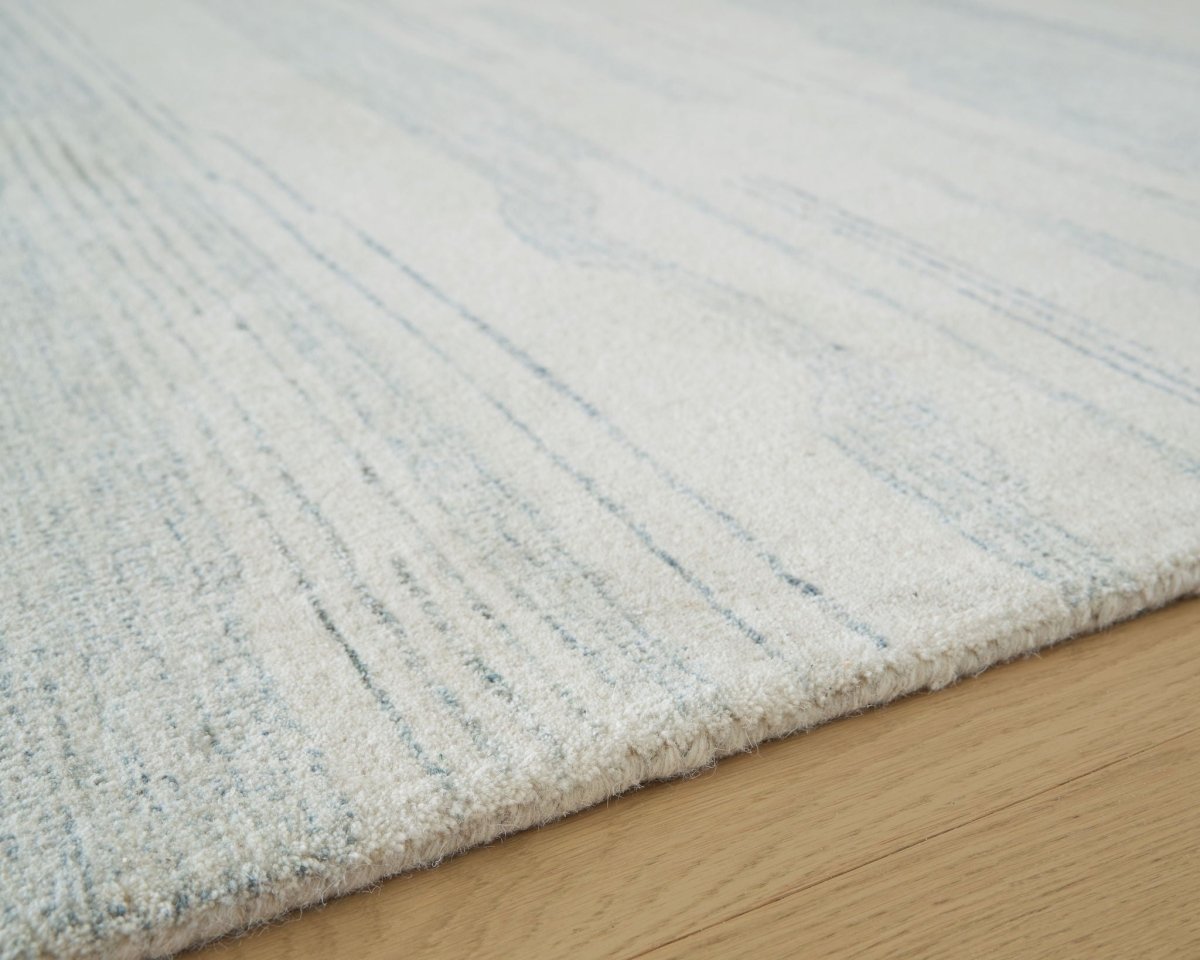 Genemost - Rug Area Rugs by Signature Design by Ashley® - Walls Furniture & Mattress