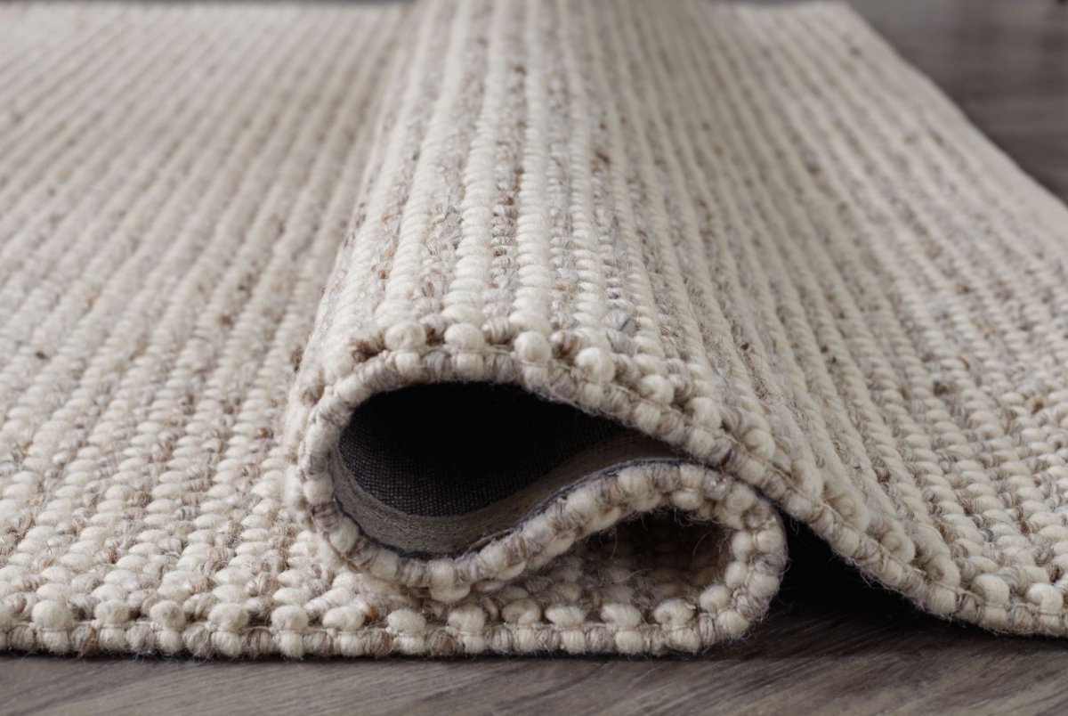 Jossick - Rug Area Rugs by Signature Design by Ashley® - Walls Furniture & Mattress