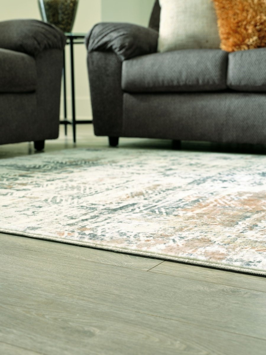 Redlings - Area Rug Area Rugs by Signature Design by Ashley® - Walls Furniture & Mattress