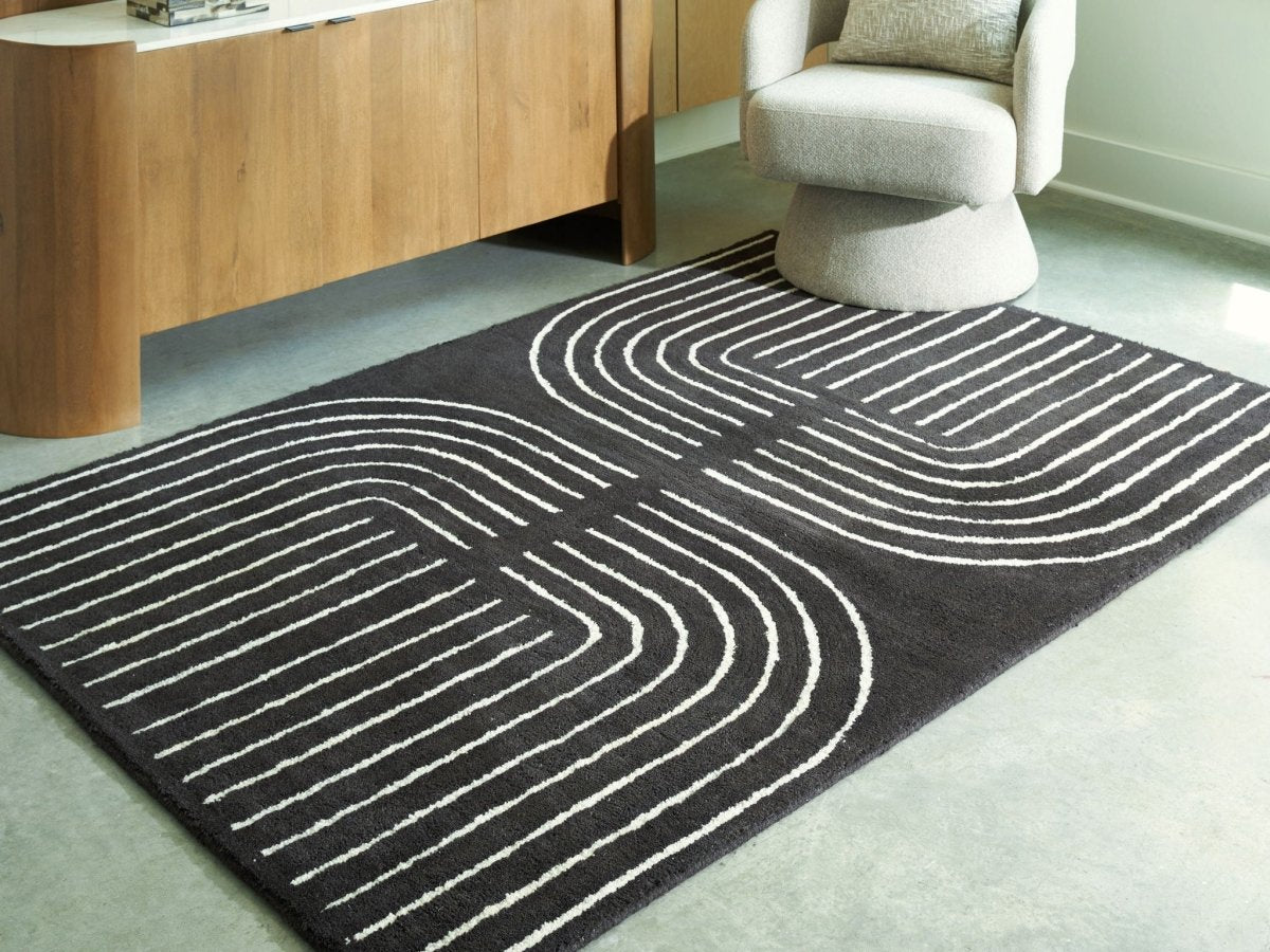 Eldonmore - Rug Area Rugs by Signature Design by Ashley® - Walls Furniture & Mattress