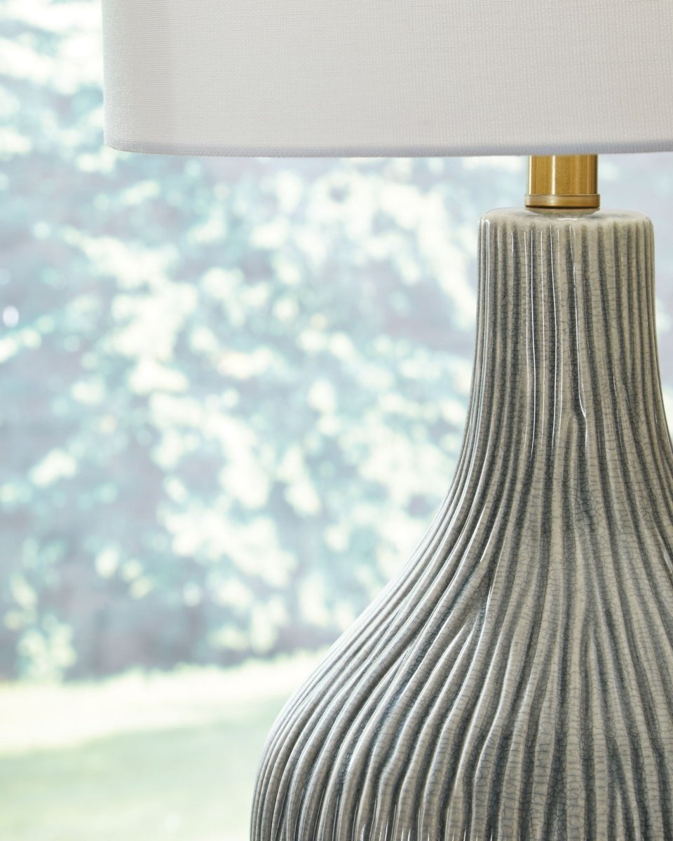 Judlen - Gray / Gold Finish - Ceramic Table Lamp Table Lamps by Signature Design by Ashley® - Walls Furniture & Mattress