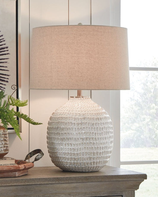 Jamon - Ceramic Table Lamp - Beige Table Lamps by Signature Design by Ashley® - Walls Furniture & Mattress