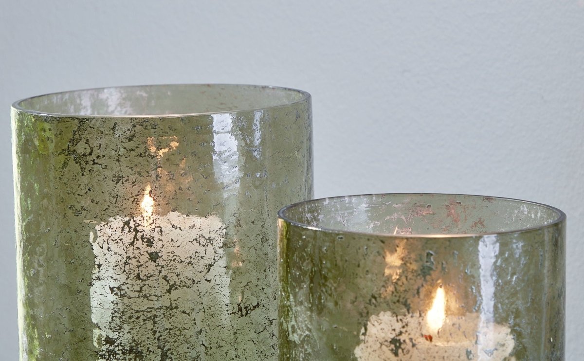 Clarkton - Candle Holder Set (Set of 2) - Green Candles & Holders by Signature Design by Ashley® - Walls Furniture & Mattress