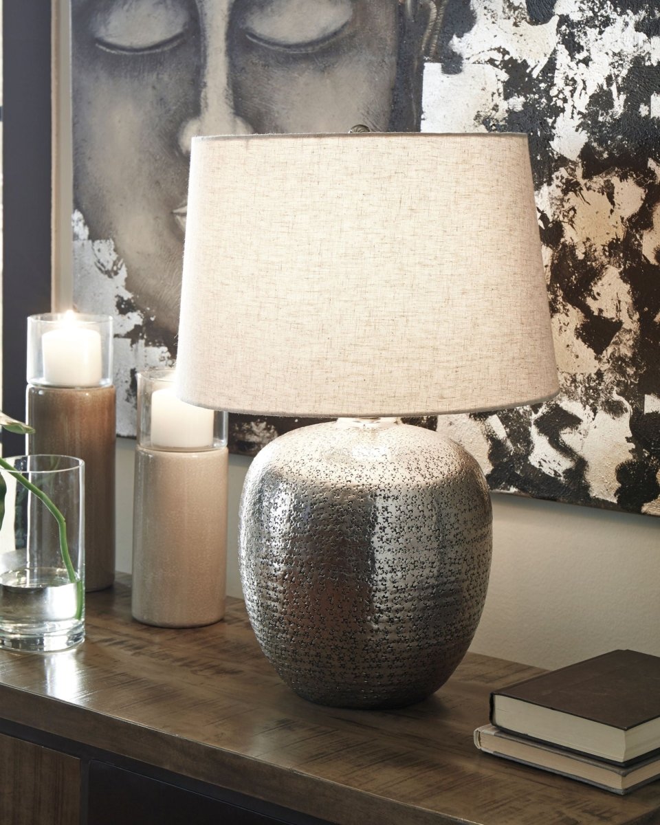 Magalie - Metal Table Lamp - Antique Silver Finish Table Lamps by Signature Design by Ashley® - Walls Furniture & Mattress