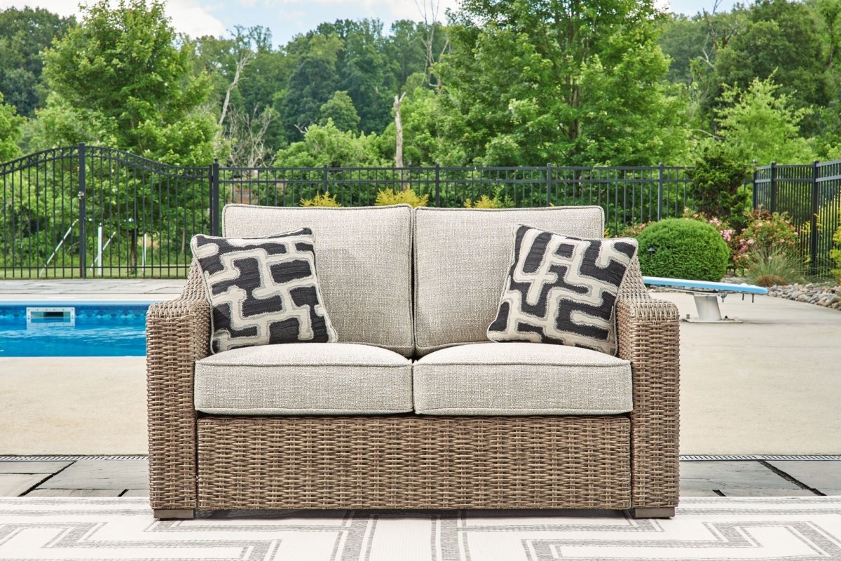 Beachcroft - Loveseat With Cushion - Beige Loveseats by Signature Design by Ashley® - Walls Furniture & Mattress