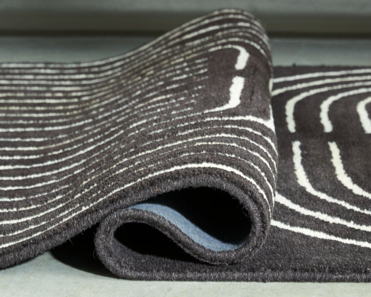 Eldonmore - Rug Area Rugs by Signature Design by Ashley® - Walls Furniture & Mattress