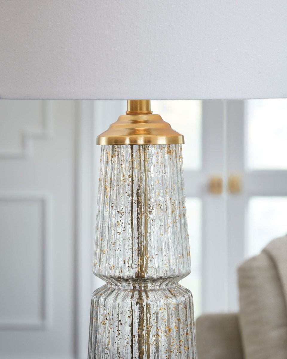 Bakersboro - Glass Table Lamp - Clear / Gold Finish Table Lamps by Signature Design by Ashley® - Walls Furniture & Mattress