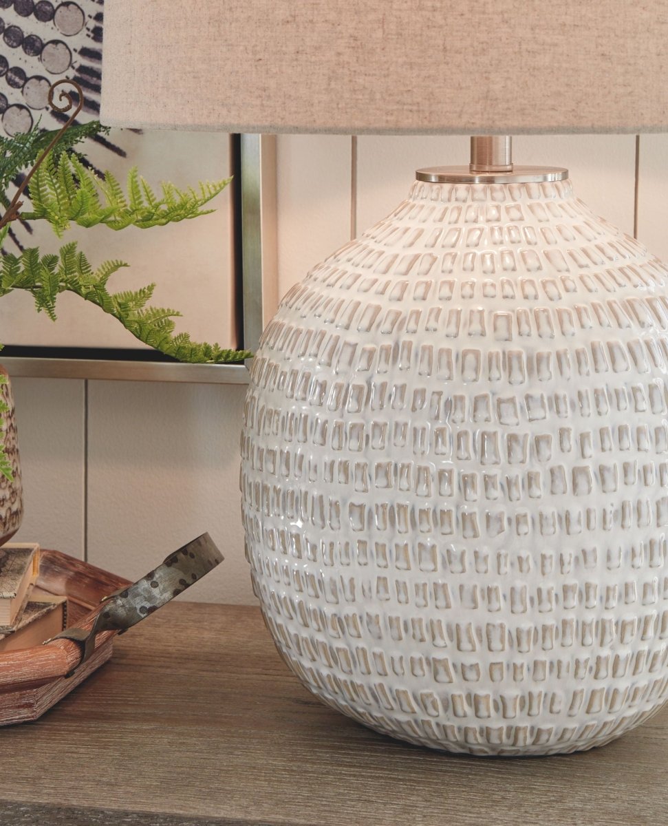 Jamon - Ceramic Table Lamp - Beige Table Lamps by Signature Design by Ashley® - Walls Furniture & Mattress