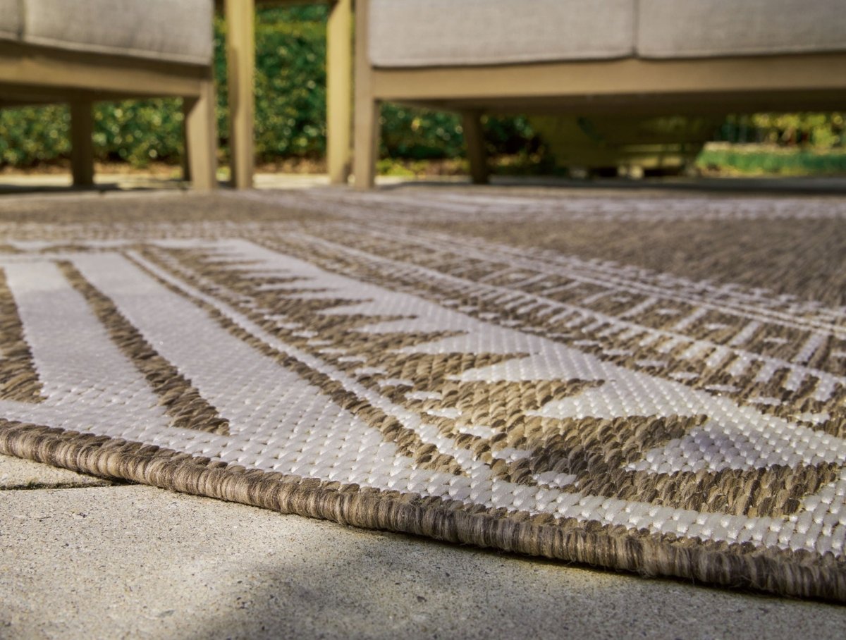 Dunsler - Rug Indoor/Outdoor Rugs by Signature Design by Ashley® - Walls Furniture & Mattress