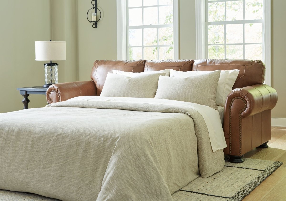 Carianna - Queen Sofa Sleeper - Caramel Sleeper Sofas by Signature Design by Ashley® - Walls Furniture & Mattress