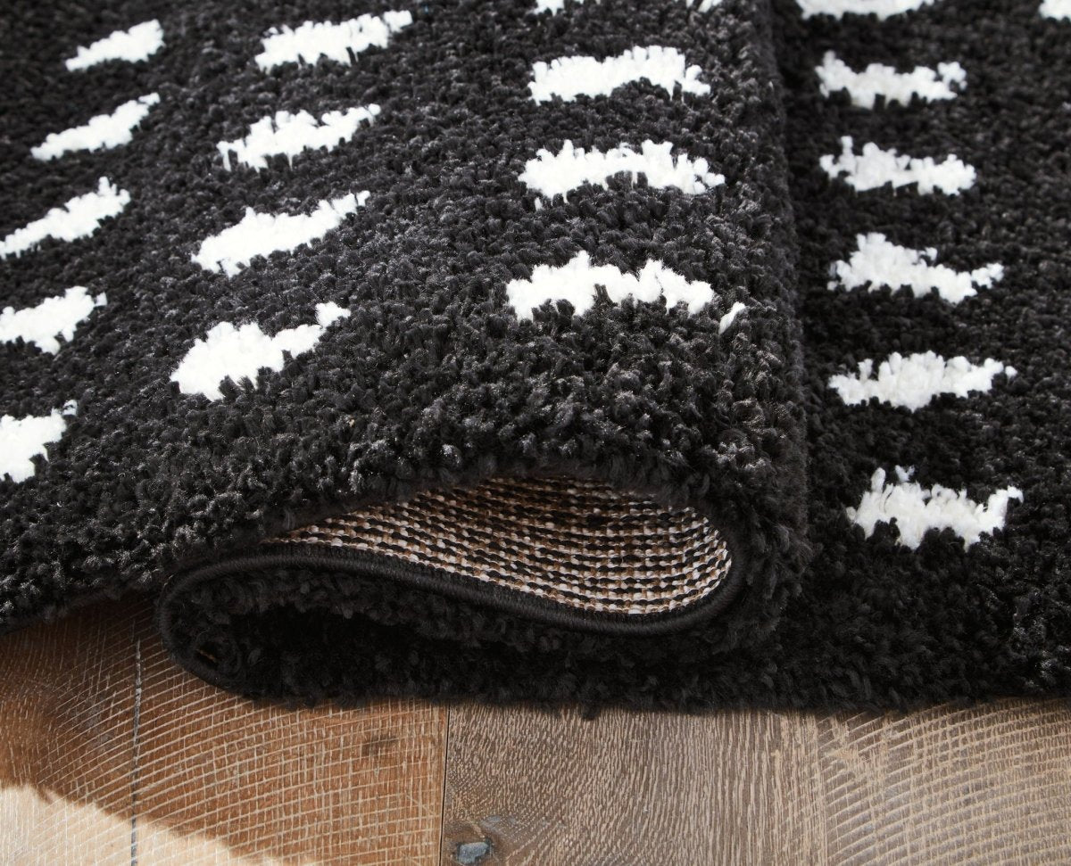 Minston - Rug Area Rugs by Signature Design by Ashley® - Walls Furniture & Mattress