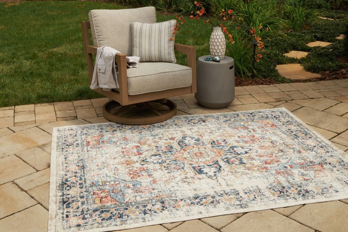 Jarrpage - Rug Indoor/Outdoor Rugs by Signature Design by Ashley® - Walls Furniture & Mattress